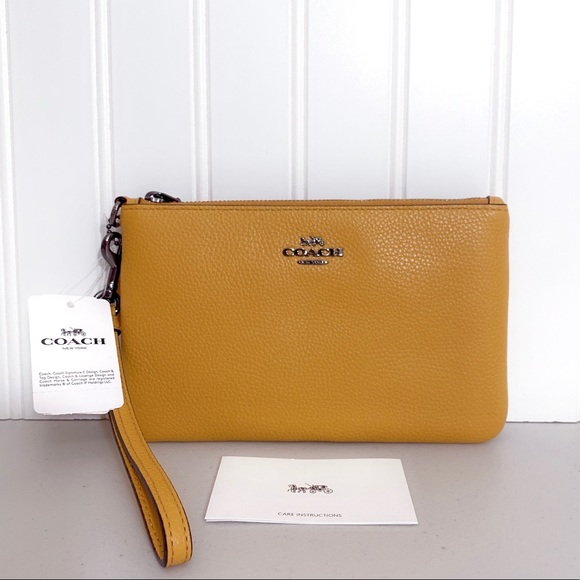 Coach Handbags - Coach Small Wristlet in Polished Pebble Leather